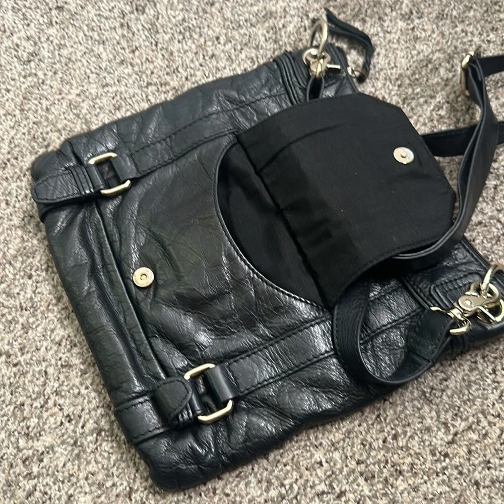 The Saks black leather cross body bag